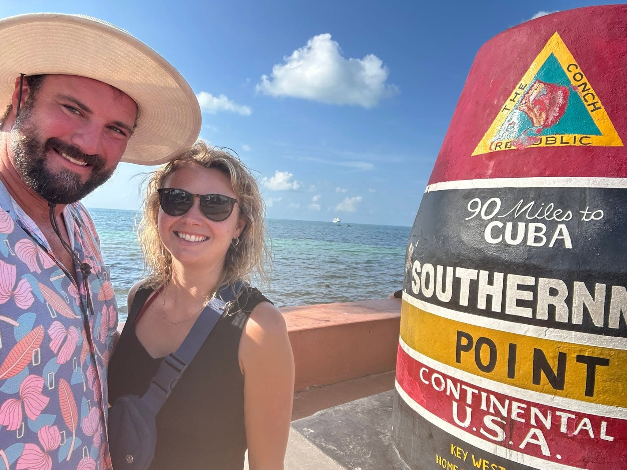 Taylor and Alexander at the Southernmost Point buoy in Key West